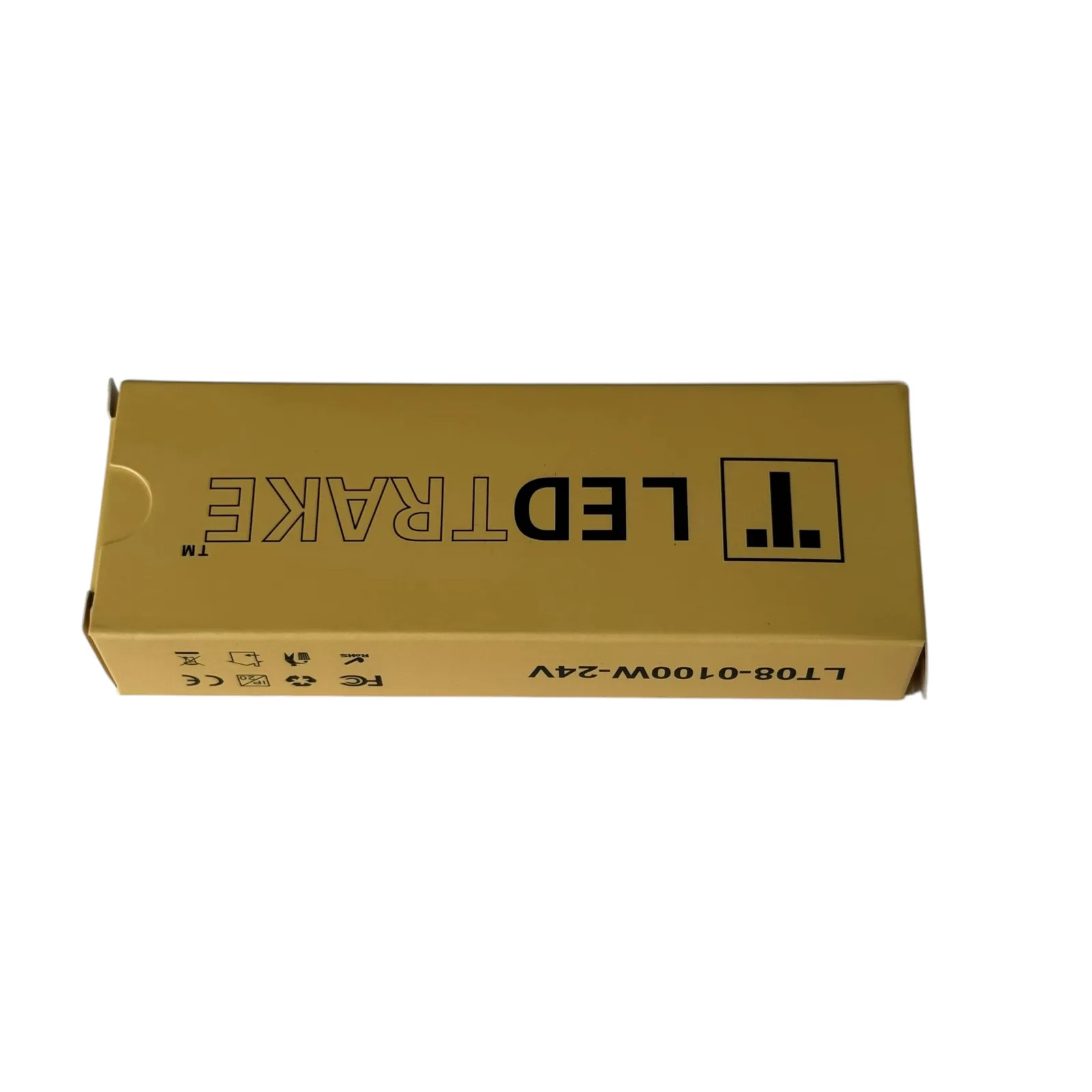 Žuta kutija LEDTRAKE sa oznakom LT08-0100W-24V uz donju ivicu