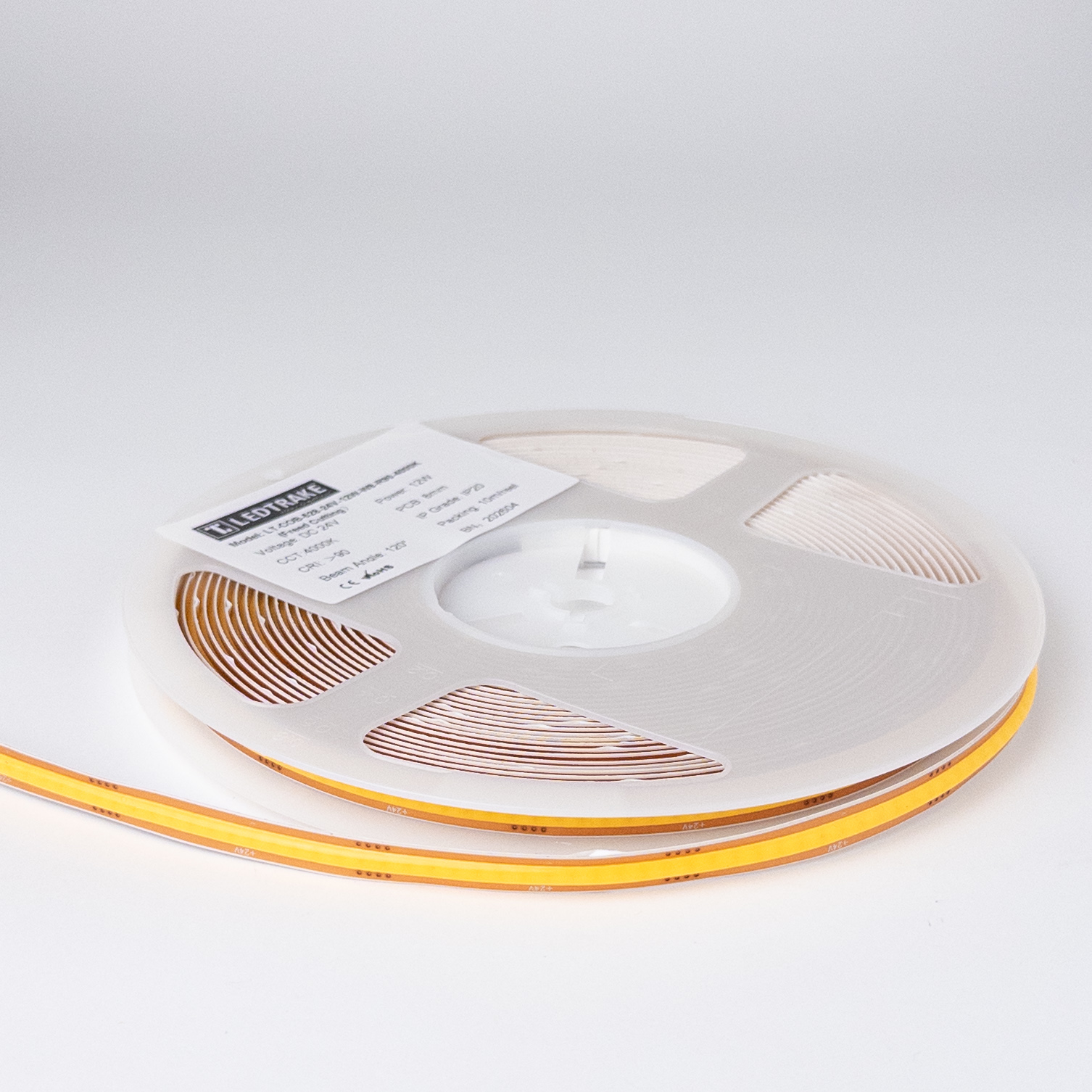 COB LED traka 12W 4000K na koturu pre paljenja, sa žutim slojem fosfora i nalepnicom Freed Cutting, DC 24V, PCB 8mm